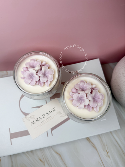 Jamaican vitality floral candle in glass container.