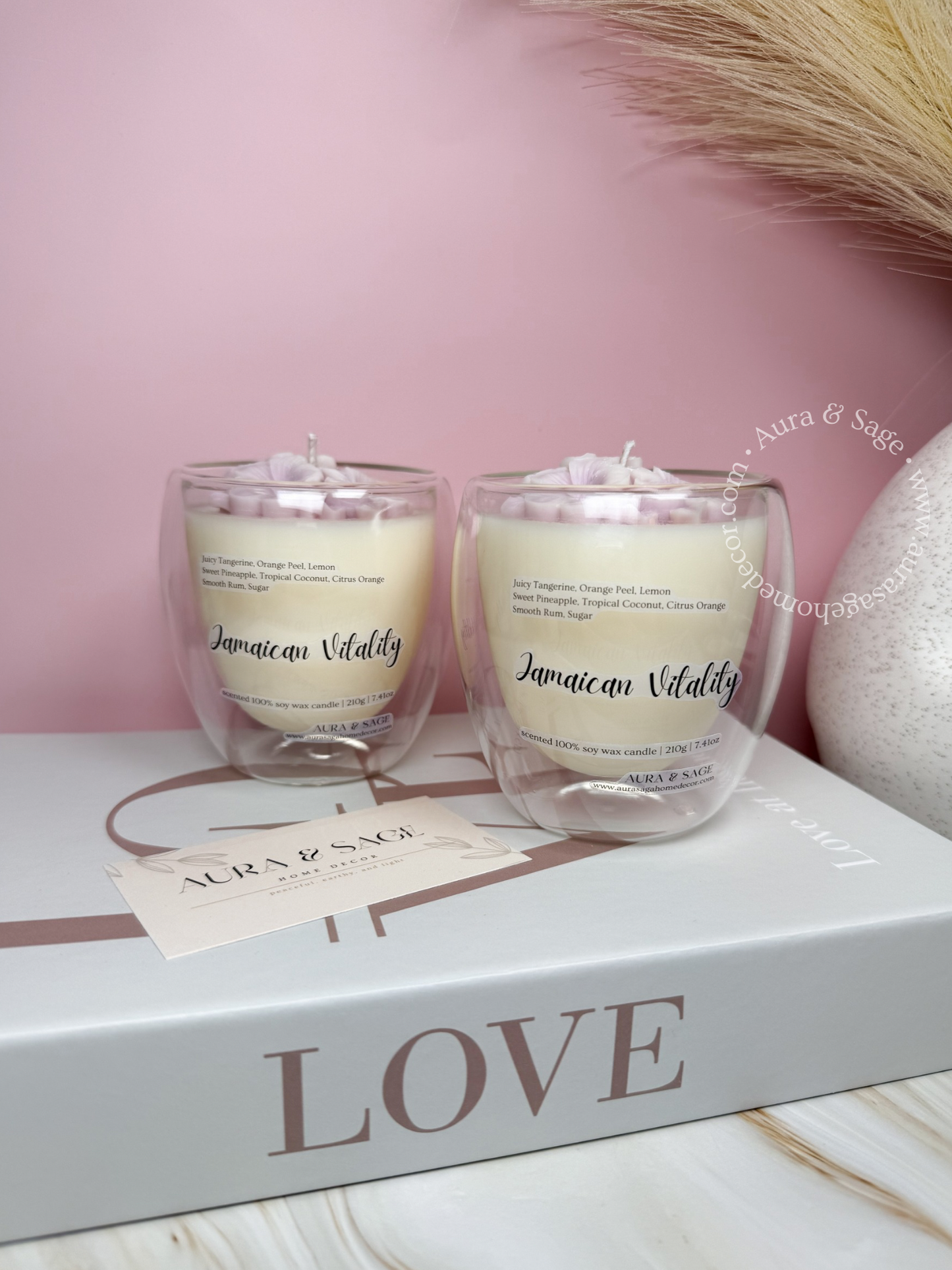 Jamaican flower inspired candle in double wall lass container.