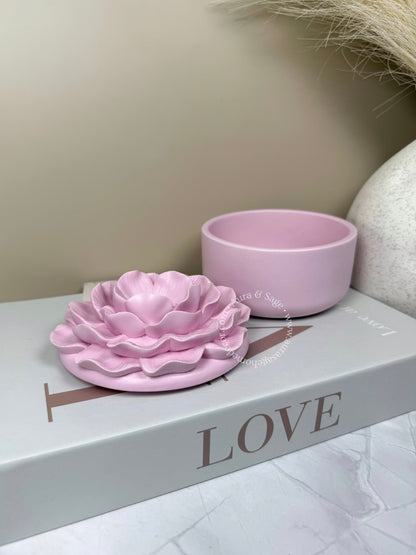 Pink ceramic flower shaped jar.