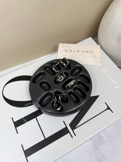 Black jewelry rings holder.