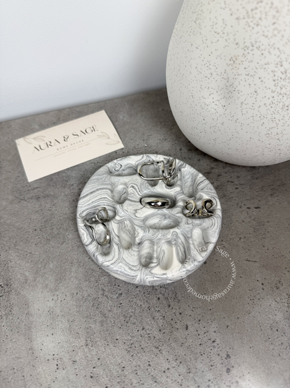 Grey marble jewelry rings holder.
