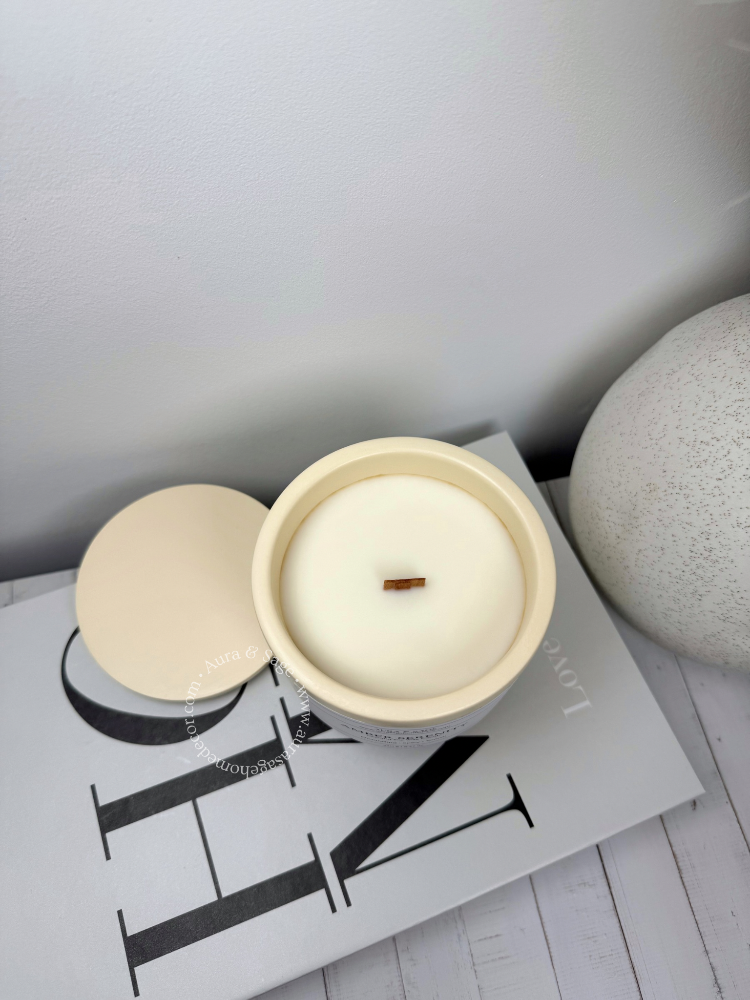 Scented candle in Jesmonite jar with lid.