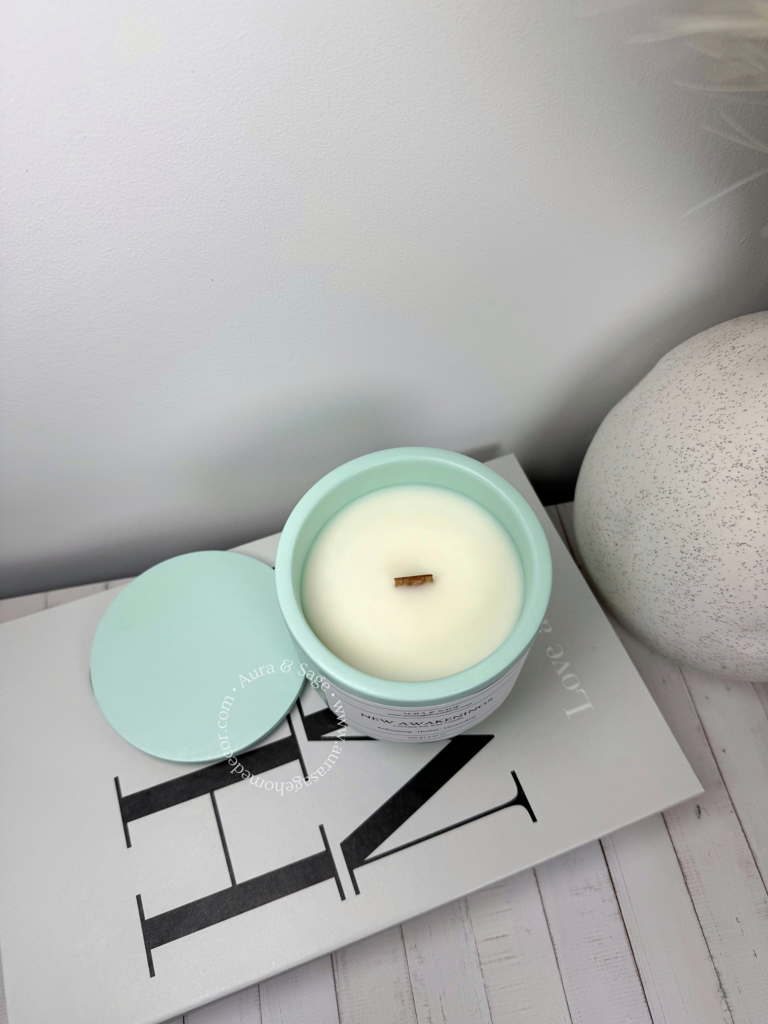 Scented candle in Jesmonite jar with lid.