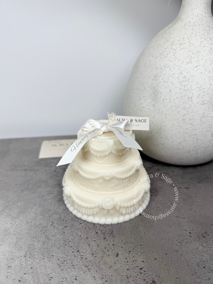 Three tiered cake with white bow, gift idea.