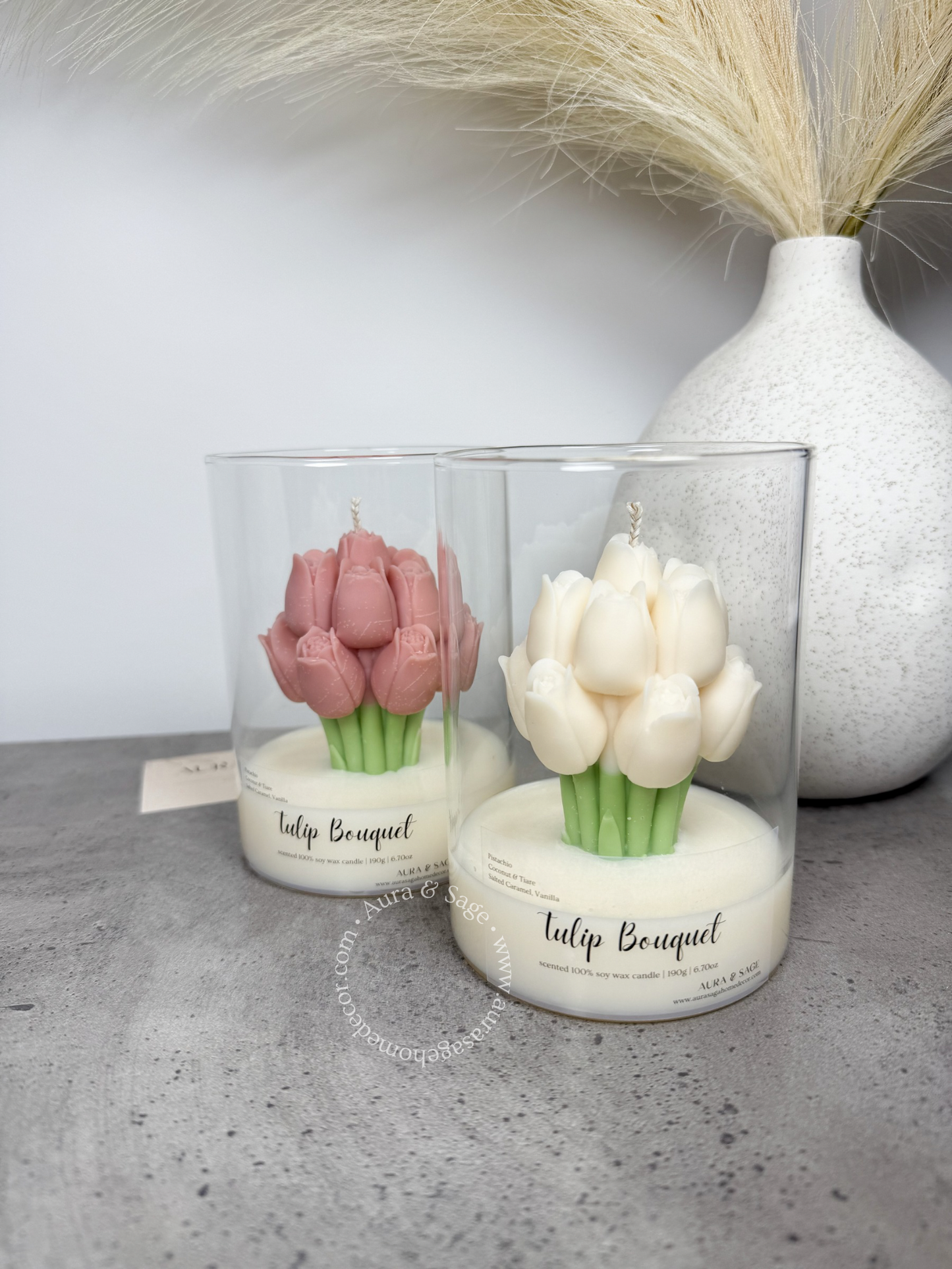 Tulip bouquet candle in a glass container.